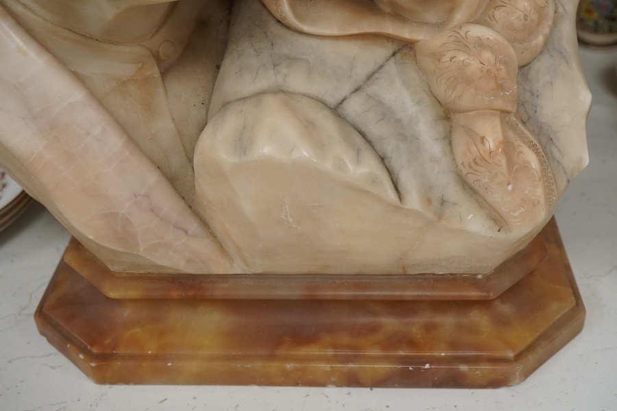 Eugenio Battiglia, (Florentine, fl. late 19th century), a carved alabaster bust of an elderly couple, 36cm high